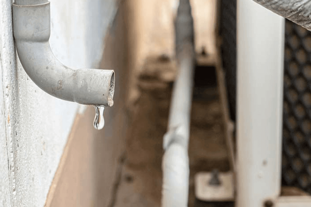 Clogged Condensate Drain Line (Water Leakage)